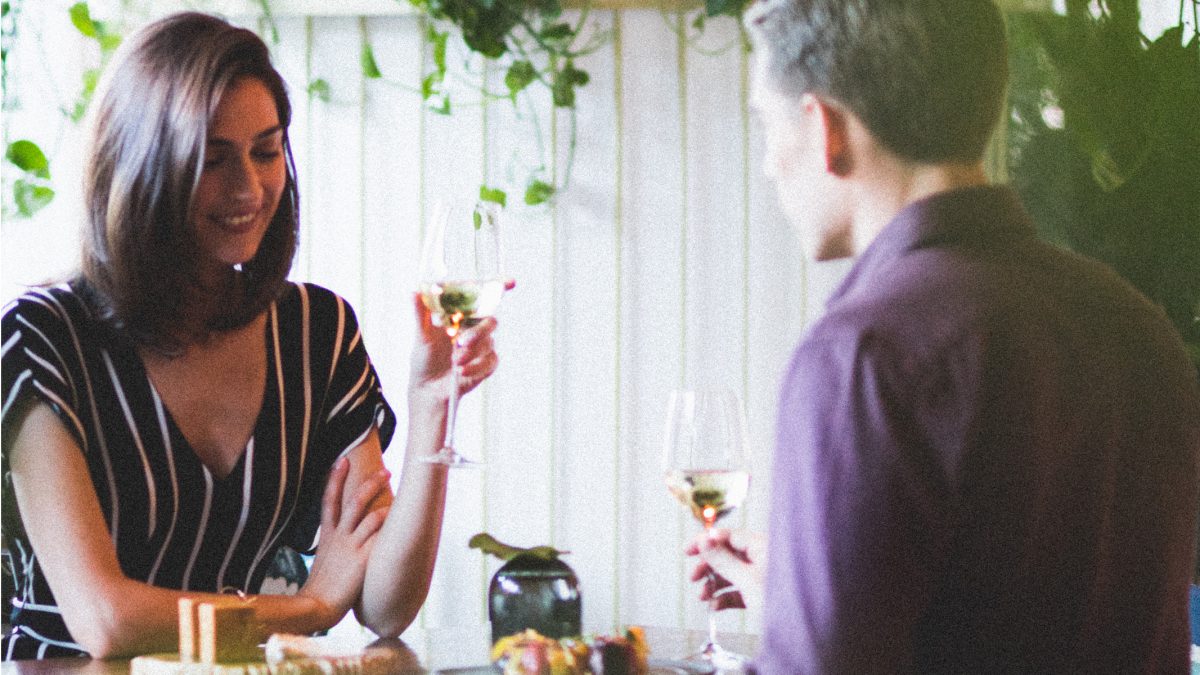 man and woman eating together