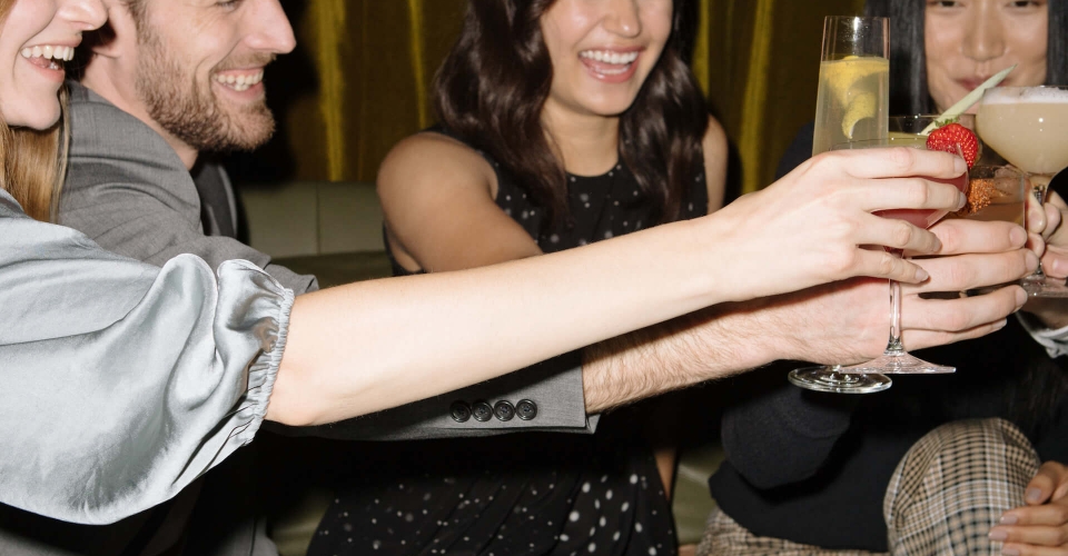 Group of friends drinking cocktails