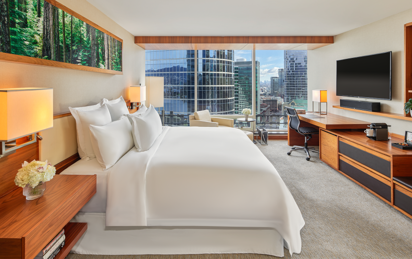 Bedroom of a city view suite at Fairmont Pacific Rim