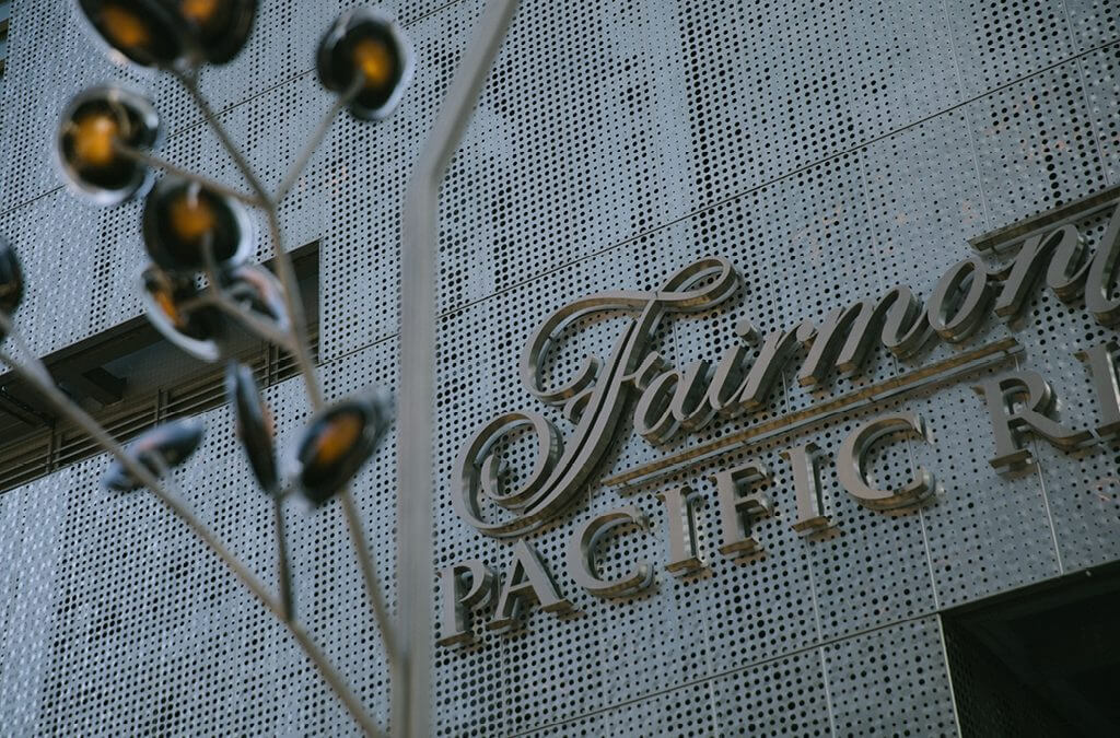 The Fairmont Pacific Rim logo on the hotel.