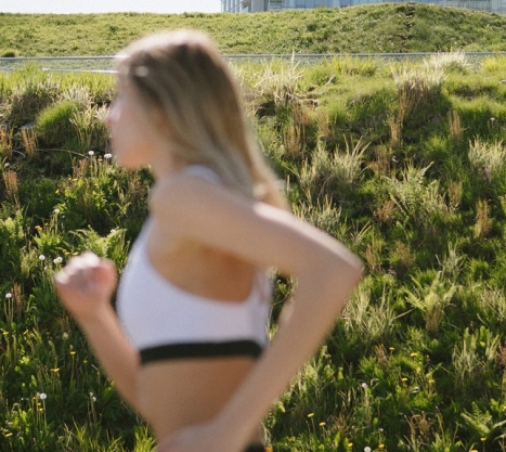 Woman running in the sunshine
