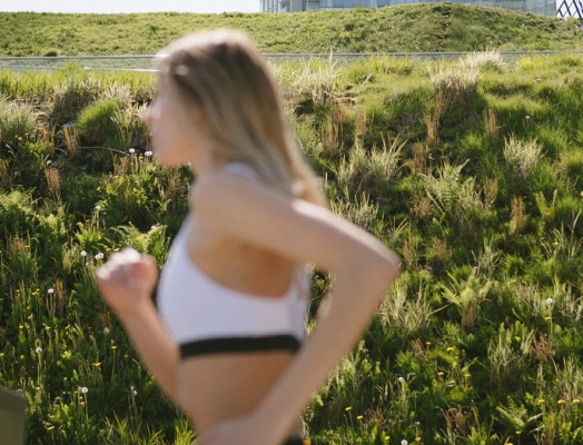 Woman running in the sunshine