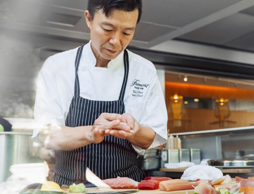sushi chef preparing sushi at Fairmont Pacific Rim