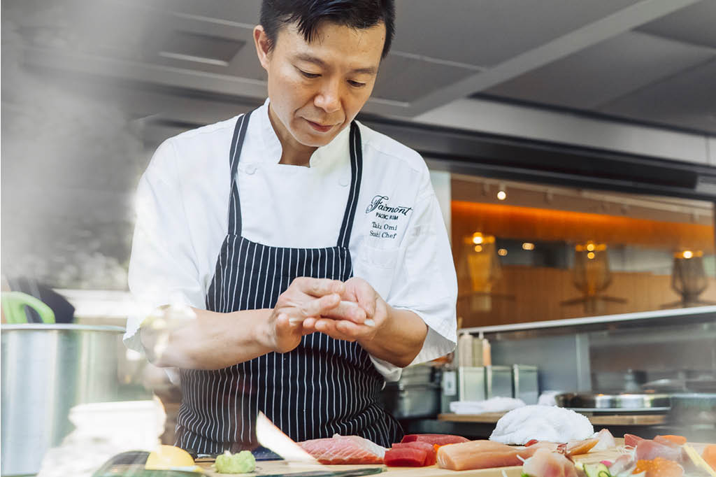 sushi chef preparing sushi at Fairmont Pacific Rim