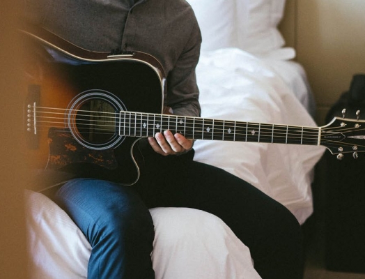 man playing guitar