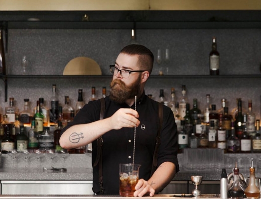 Bartender mixing a cocktail