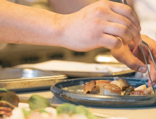 a chef prepares food