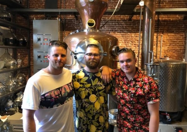 Three men in tropical shirts