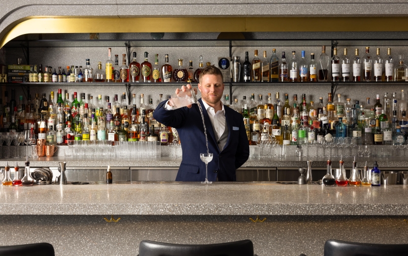 Grant Sceney pouring a drink at Botanist Bar in downtown Vancouver