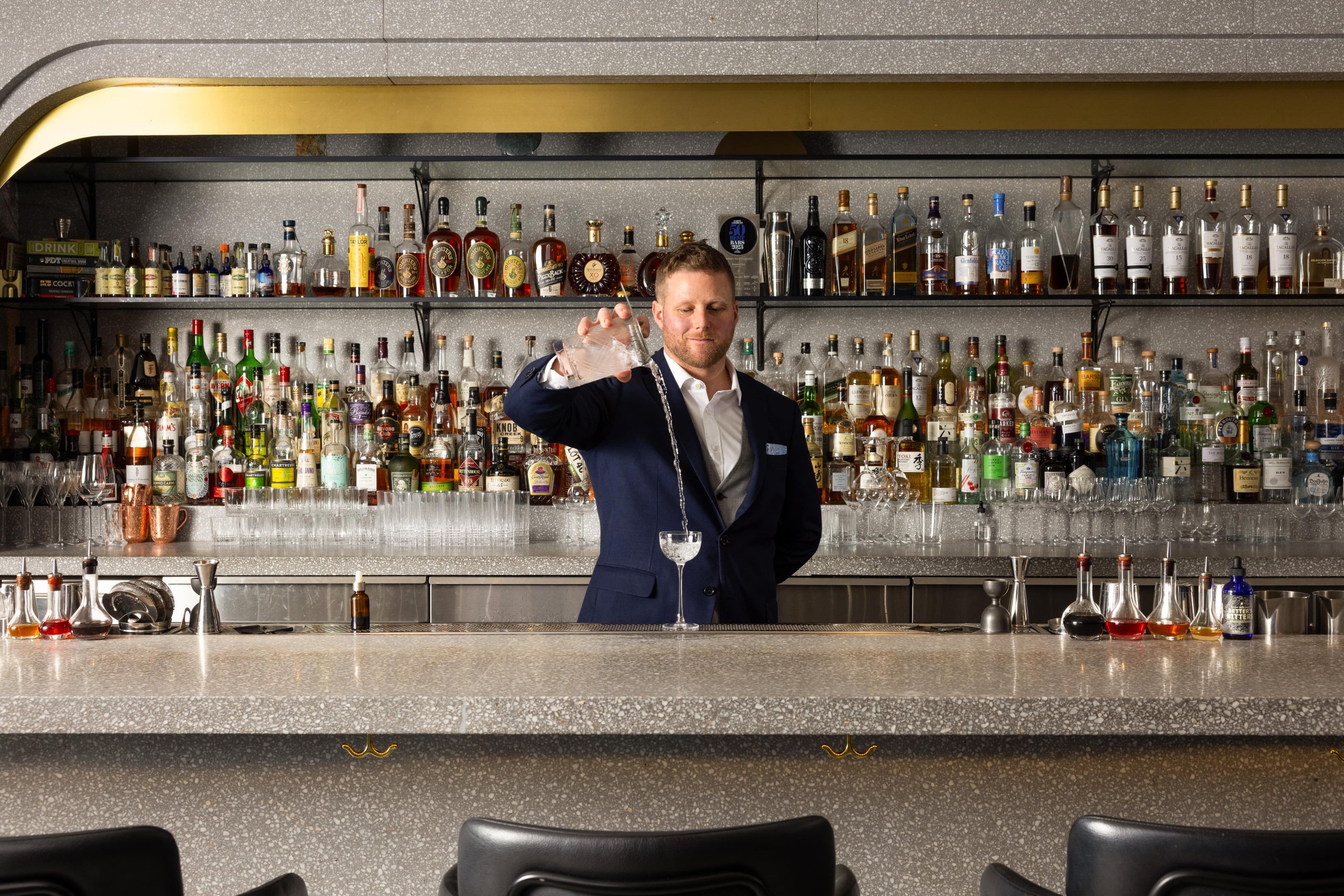 Grant Sceney pouring a drink at Botanist Bar in downtown Vancouver
