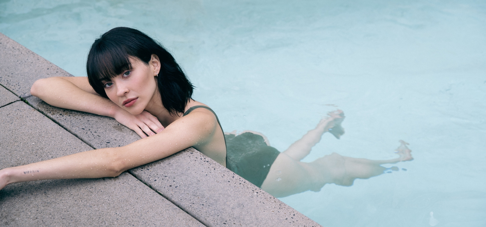 Woman by the pool