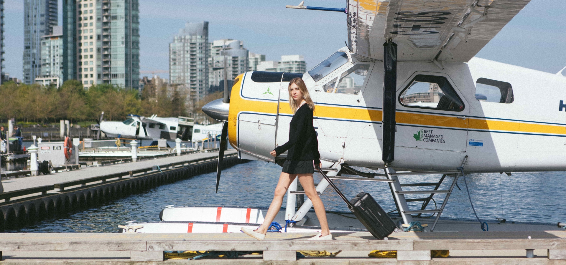 Woman who just landed in Vancouver through Harbour Air on her way to Fairmont Pacific Rim