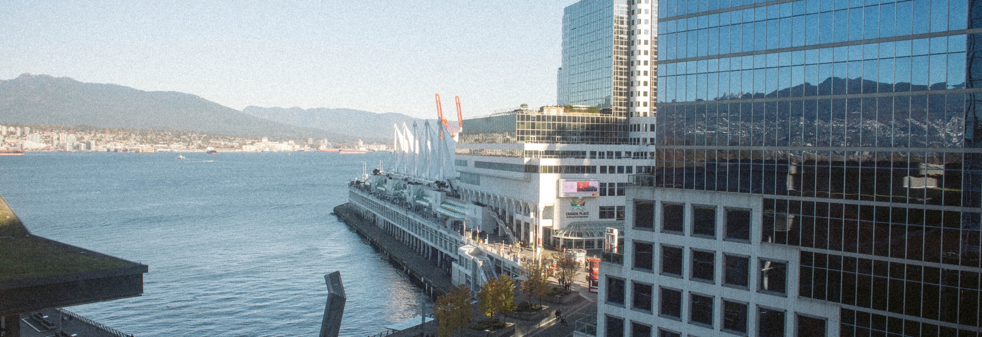 Hotel view of North Shore mountains and Canada Place