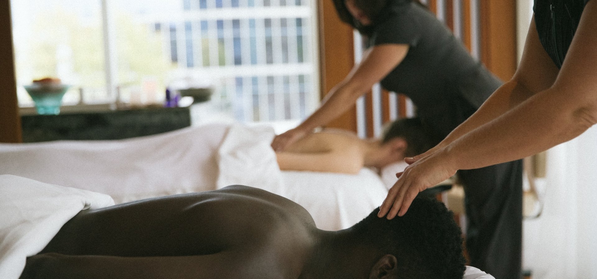 A couple getting a couples spa massage in Vancouver