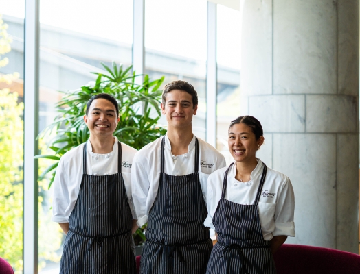 Three cooks at Fairmont Pacific Rim for a culinary competition