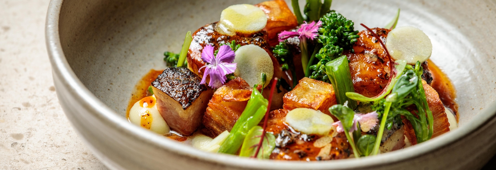 Pan seared scallop dish at Botanist