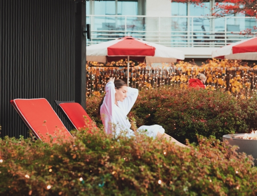 Woman relaxing at The Nordic Spa at Fairmont Pacific Rim