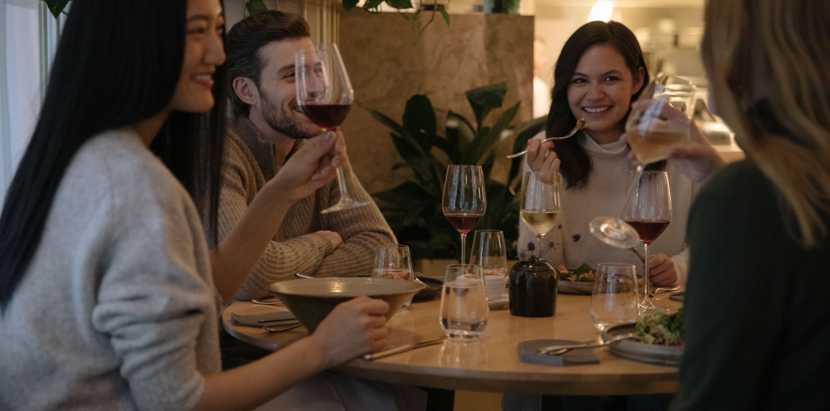 People celebrating Christmas at Botanist at Fairmont Pacific Rim