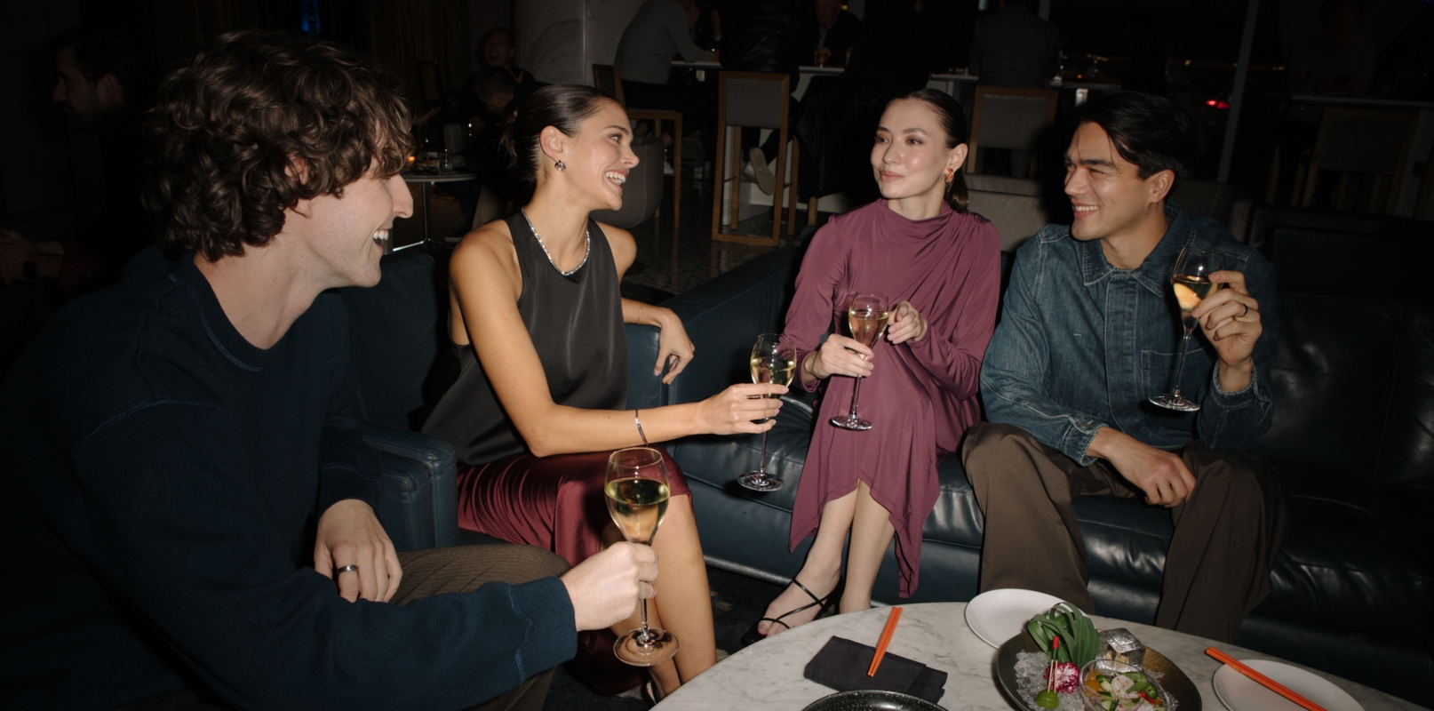 Group of friends enjoying cocktails in Vancouver