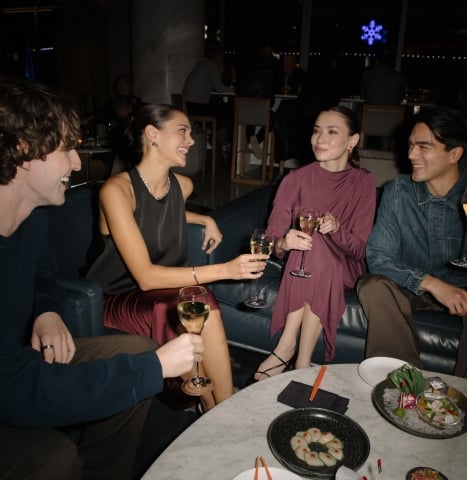 Group of friends enjoying cocktails in Vancouver
