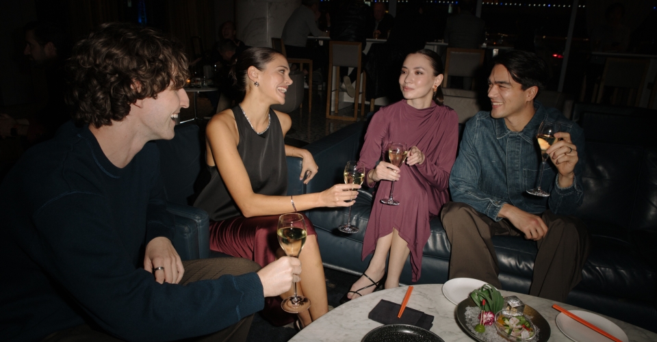 Group of friends enjoying cocktails in Vancouver