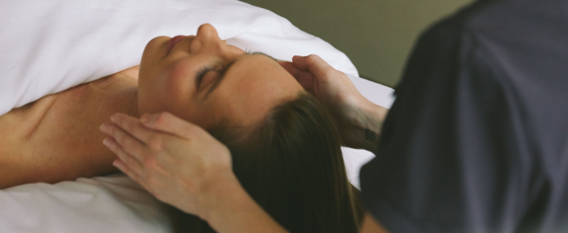 Woman receiving a facial treatment at a luxury spa in Vancouver
