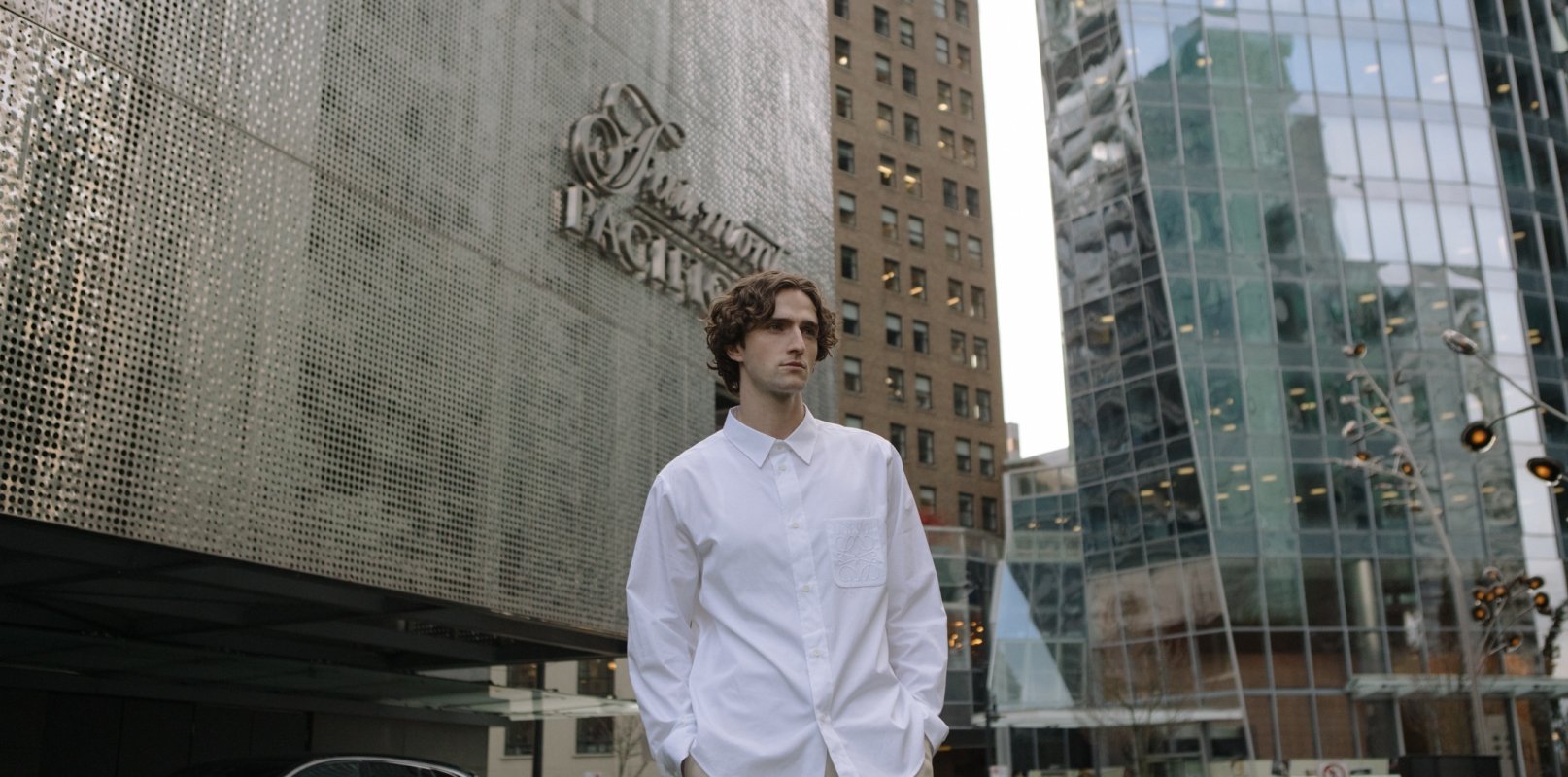 Man in front of Fairmont Pacific Rim
