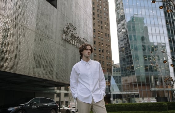 Man in front of Fairmont Pacific Rim