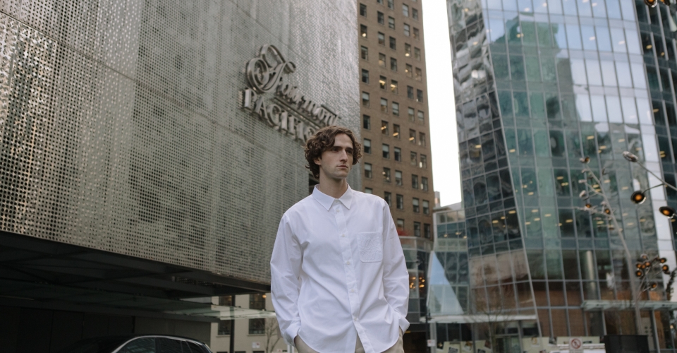 Man in front of Fairmont Pacific Rim