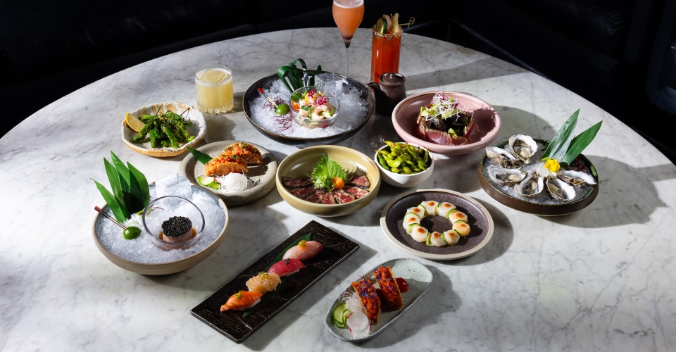 A spread of Asian food in Vancouver at The Lobby Lounge inside Fairmont Pacific Rim